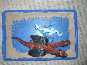 Sand-tray by boy 8yrs 'trapped dragons'